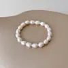 Pulseira de Pérolas Naturais de Água Doce Genuínas para Mulheres, Não Desbota, de Alta Qualidade, Elegante, Pulseira em Formato de Arroz com Fio Elástico, Joia Simples para Mão
