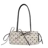 Bolso de hombro de moda con lazo de alto valor 2026 otoño nuevo diseño de nicho elegante y chic bolsa para debajo del brazo estilo ins