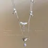 Collar Saturno de Perlas Multicapa para Mujer Diseño de Nicho Lujo Ligero Cadena de Clavícula de Alta Calidad Cadena Dulce Fresca Versátil para Suéter