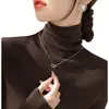 Suéter de capa base de cuello alto otoño e invierno nuevo estilo top de cuello de pelo jersey de manga larga tejido elegante ajuste ceñido tejido de punto blanco