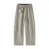 Muqiu Moda Masculina Coleção Outono 2026: Calça de Moletom Desconstruída com Corte Curvo, Calça Casual Larga Solta Unissex