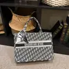 Bolso de Hombro de Lona para Mujer 2026 Nuevo de Moda de Gama Alta Bolso Tote para Viajar de Gran Capacidad Bolso de Compras con Letras