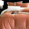 2026 nuevo juego de ropa de cama de alta gama de cuatro piezas de vellón de coral cálido de invierno, sábana y funda de edredón de franela de leche