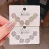 2025 Nuevo Estilo Caliente Exquisitos Pendientes Pequeños de Flor y Circonita Set de Tres Pares Estilo de Lujo Accesible para Mujer Set de Seis Pares de Pendientes