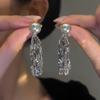 Aretes de Aro Liso Ola Plateada para Mujer, Lujo Ligero, Frescos y Sofisticados, Diseño Simple de Espiral Antimosquitos, Clips para Orejas sin Perforar