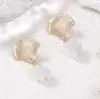 Brincos Pendentes de Liga Metálica com Concha e Pérola Imitação Estilo Oceano de Férias Elegante de Luxo Leve Transfronteiriços Versáteis Casuais Femininos