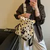 Bolsa de Cubo Fresca y Dulce al por Mayor para Mujer 2026 Verano Nuevo Bolso de Hombro de Lunares de Nicho Mochila Versátil
