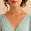 Collar con colgante de luna y cuerno hecho a mano de aleación con lentejuelas y cadena de clavícula para mujer, estilo retro transfronterizo europeo y americano