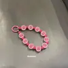 Estilo nuevo y popular transfronterizo Color dopamina hecho a mano con cuentas accesorios de moda de alta gama colgante versátil para teléfono móvil