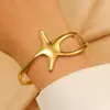 Pulseiras Largas Europeias e Americanas de Aço Inoxidável de Alta Resistência com Espiral Ondulado, Estrela do Mar, Esmalte Azul e Designs de Concha em Vários Estilos para uma Vibe Praiana