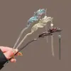 Pinza para el pelo de metal con forma de pluma, genial y única, para mujer; pinza de alta gama con borlas para la parte trasera de la cabeza; nuevo pinza para recogido estilo chino