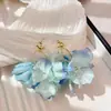 Aretes de Flor de Tela con Vibe de Playa como Aguja de Plata, de Moda y Dulces, con un Toque de Lujo Ligero y Sensación de Alta Gama