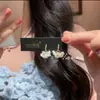 Pendientes de Flor Qinru Explosive Spring Niche de Alta Gama Pétalos Lujo Ligero Elegantes Versátiles Frescos para Dama Dulce Lindos