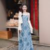 Vestido largo sin espalda estilo étnico de Yunnan para vacaciones, vestido playero elegante azul con tirantes y estilo súper hada.