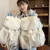 Mochila con tapa abatible de nuevo estilo transfronteriza para mujer, Mochila simple para escuela secundaria, Mochila casual de viaje ligera y elegante
