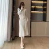 Falda de punto negra, nueva moda de otoño, estilo elegante de socialité, conjunto de dos piezas con cárdigan y falda de cuello con flecos
