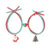Nuevo colgante navideño europeo y americano rojo y verde imán de amor cuerda elástica pulsera de pareja un par de pulseras para hombre y mujer venta al por mayor