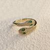 Anillo abierto de serpiente bicéfala estilo europeo y americano, moda personalizada de lujo, incrustado con circón, anillo de serpiente de ojo verde, suministro de comercio exterior