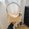 Bolso de Alta Gama Transfronterizo para Mujer Verano 2026 Nueva Moda Bolso de Hombro Cruzado Versátil Bolso de Mano Tipo Cubo