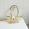 Bolso tote de estilo francés con nicho y asa larga, nuevo diseño de moda, bolso baguette de alta calidad, moderno y versátil, perfecto para llevar debajo del brazo