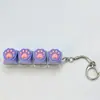Chaveiro Botão Luminoso de Patinha de Gato Chave de Teclado Switch Tecla de Teclado Brinquedo Descompressão Pingente de Bolsa Chaveiro