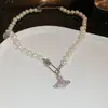 Popular Exquisito Colgante de Planeta Collar de Perlas Lujo Ligero Cadena de Clavícula de Gama Alta Moda de Nicho Versátil Collar Venta al por Mayor