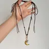 Nuevo collar popular de estilo coreano con estrella y luna tachonadas de diamantes, diseño de nicho, cadena ligera de lujo para la clavícula, accesorio moderno y versátil