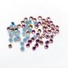 Cristal redondo rosa rojo mágico de imitación de diamantes de imitación Ao, promoción transfronteriza de AliExpress con un 10% de descuento, adhesivo termofusible en la parte inferior, diamantes de imitación para ropa Xiuhe.