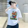 Verano 2026 Nuevo Estilo Camiseta de Manga Corta para Niños Estilo Coreano Ropa de Algodón Fresca con Estampado de Dibujos Animados de Media Manga para Niños Camiseta
