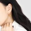 Pendientes de moda transfronterizos europeos y americanos con patrón de martillo irregular, personalidad femenina, hebilla de oreja de acero de titanio con baño de oro simple y combinable.