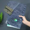 Calça jeans masculina, novo modelo outono 2026, calça skinny slim-fit moderna, estilo coreano, calça longa casual stretch Xintang