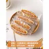 Pastel de concha de arroz glutinoso, concha a prueba de viento, nuez de almendra caramelizada, popular snack de postre en línea, productos horneados semiacabados al por mayor