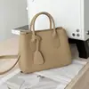 Bolso de mano de cuero genuino para mujer, bolso cruzado simple para el día a día, bolso de hombro de nicho de alta gama, nuevo bolso tote 2026