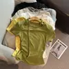 Camiseta Coreana Picante de Hombros Descubiertos con Tachuelas de Manga Corta para Mujer, Verano 2026 Nuevo Diseño de Nicho Ajustado Top Adelgazante
