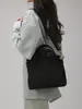 Bolso de lona de comercio exterior nuevo con gran capacidad y múltiples compartimentos, bolso de mano cruzado versátil y casual para el día a día y bolso de hombro para mujer