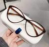 Nuevos anteojos cat-eye ultraligeros anti-luz azul para miopía, estilo europeo y americano, artefacto de aspecto sencillo, adelgazantes para cara redonda, de alta gama, con lentes planos