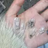 Accesorios de aleación para decoración de uñas navideña personalizados con pedrería, perlas, coronas y lazos, venta al por mayor de juegos completos de decoración para uñas