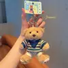 Fábrica de Peluches Jintian Oso Pequeño Versátil Colgante de Peluche Casual Llavero de Mochila Lindo Juguete de Muñeca para Pareja