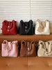 Bolso de Mano Informal de Moda Nicho Estilo Coreano Transfronterizo para Mujer Modelo Nuevo Primavera 2026 Bolso Cubo de Hombro Cruzado