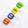 Mini llavero de acero inoxidable cinta métrica retráctil automática 1m cinta métrica portátil con doble escala regalo creativo regla de acero