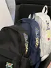 Mochila Cartoon Campus Transfronteiriça para Mulheres 2026 Novo Estilo Moda Casual Versátil Mochila Escolar Estudante Mochila de Viagem