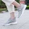 Zapatos de mujer 2023 nuevos primavera y otoño tejido volador casuales de caña baja slip-on planos zapatos de hombre viejo al por mayor zapato de mujer
