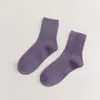 Meias novas femininas cor sólida algodão penteado japonês quatro estações meias cano alto preto e branco JK cor doce meias femininas simples atacado