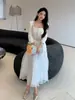Nuevo Vestido Blanco de Cuadrado para Mujer Otoño e Invierno 2025 Elegante Falso Dos Piezas Lana Empalmada Chifón Plisado Falda Larga