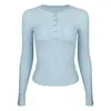 Nueva colección de ropa de yoga para mujer de otoño e invierno, camiseta deportiva de manga larga con cuello Henley de estilo vintage, corte ajustado, que estiliza la figura, ideal para correr, entrenar y hacer ejercicio.