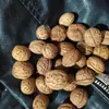 Material de talla de hueso de durazno templo cinabrio nuez de durazno nuez semillas sueltas para jugar almohada cervical bolsa para palmear materia prima joyería pulsera