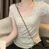 Venta al por mayor del fabricante Camiseta de manga corta de Tencel acanalado de verano, estilo Chica Pícara Puro Deseo, diseño adelgazante que ciñe la cintura, con lunares, para mujer