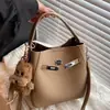 Bolsa Kelly de Luxo para Mulheres 2026 Nova Moda Bolsa de Palha de Mão Estilo Coreano Versátil Bolsa de Ombro Transversal