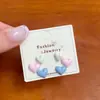 Nuevos Pendientes Pequeños Sencillos de Corazón Rojo para Mujer Otoño e Invierno, Una Tarjeta, Tres Pares, Pendientes Pequeños Estilo Estudiante Crema Gota de Aceite