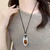 Moda Minimalista Estilo Cos Colgante Oval Ojo de Caballo Cordón de Cuero Negro Collar Largo Cadena de Suéter Ajustable Accesorio Gargantilla